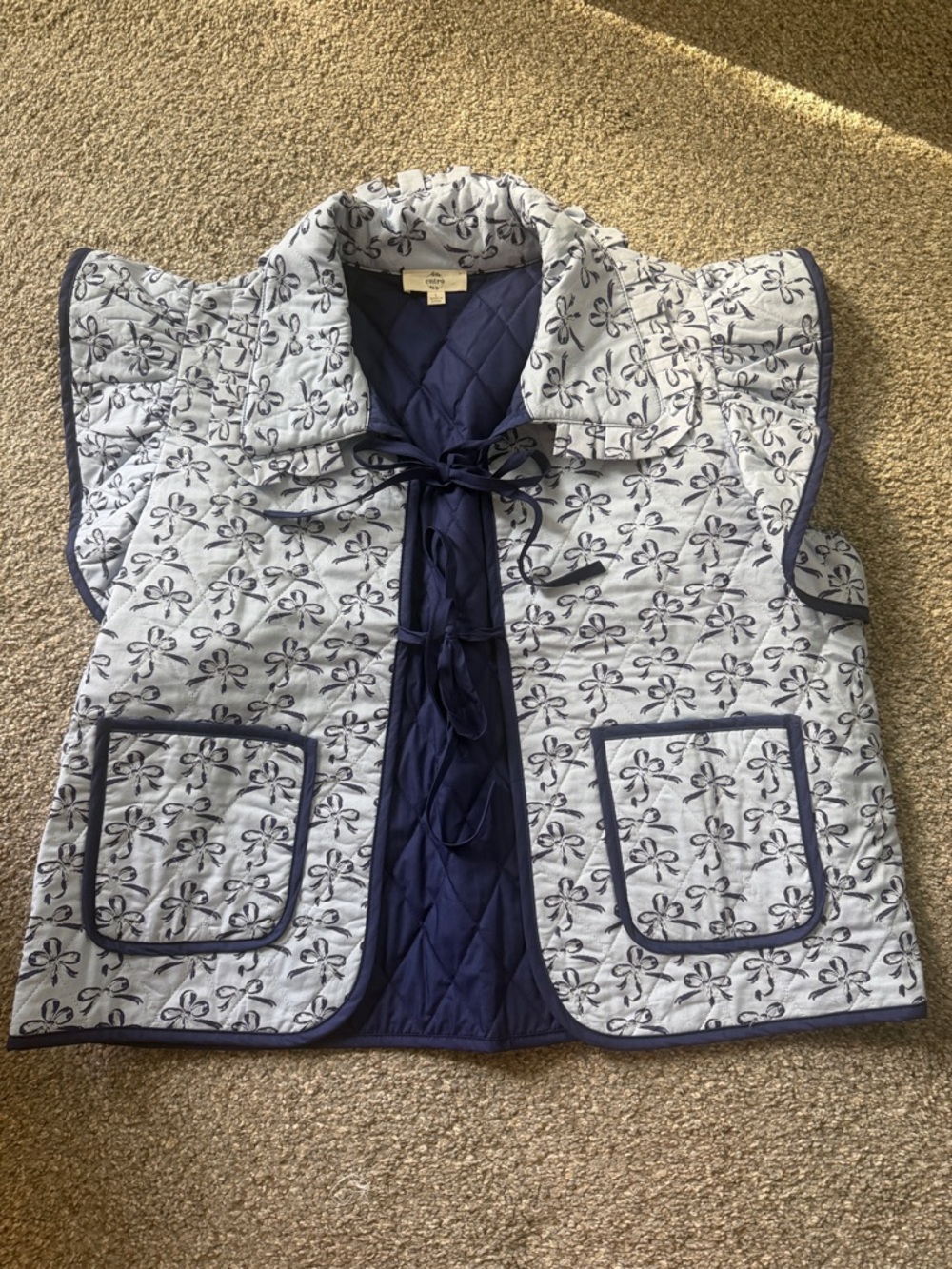 entro Navy Lined Quilted Vest with Light Gray Bow Print